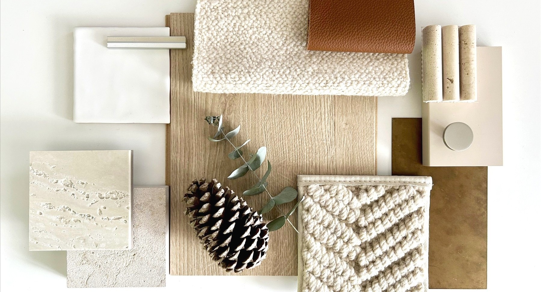 CKH Interiors materials and finishes sample board — stone, timber, wool and leather
